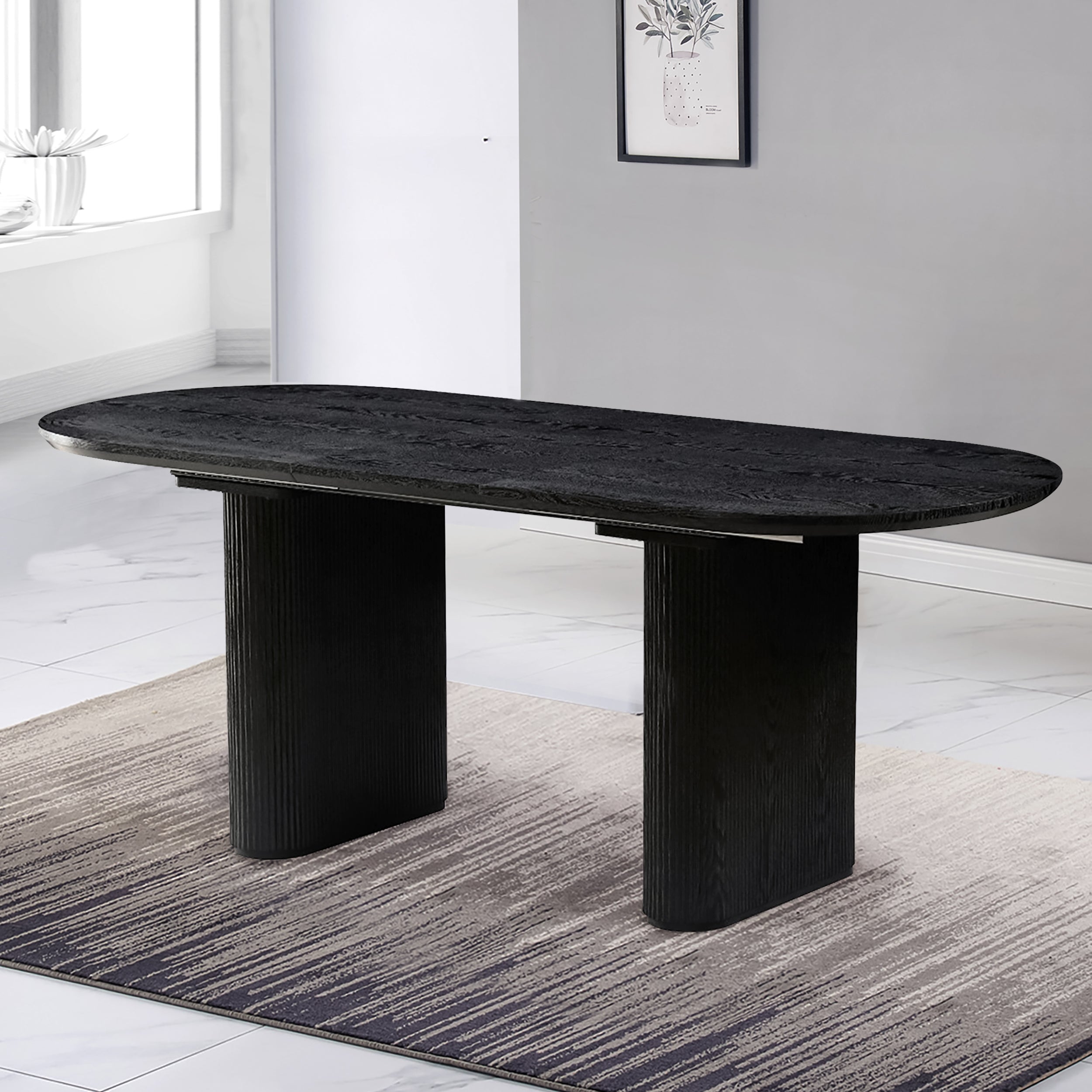 Black extendable oval dining table 6 8 seater in modern dining room
