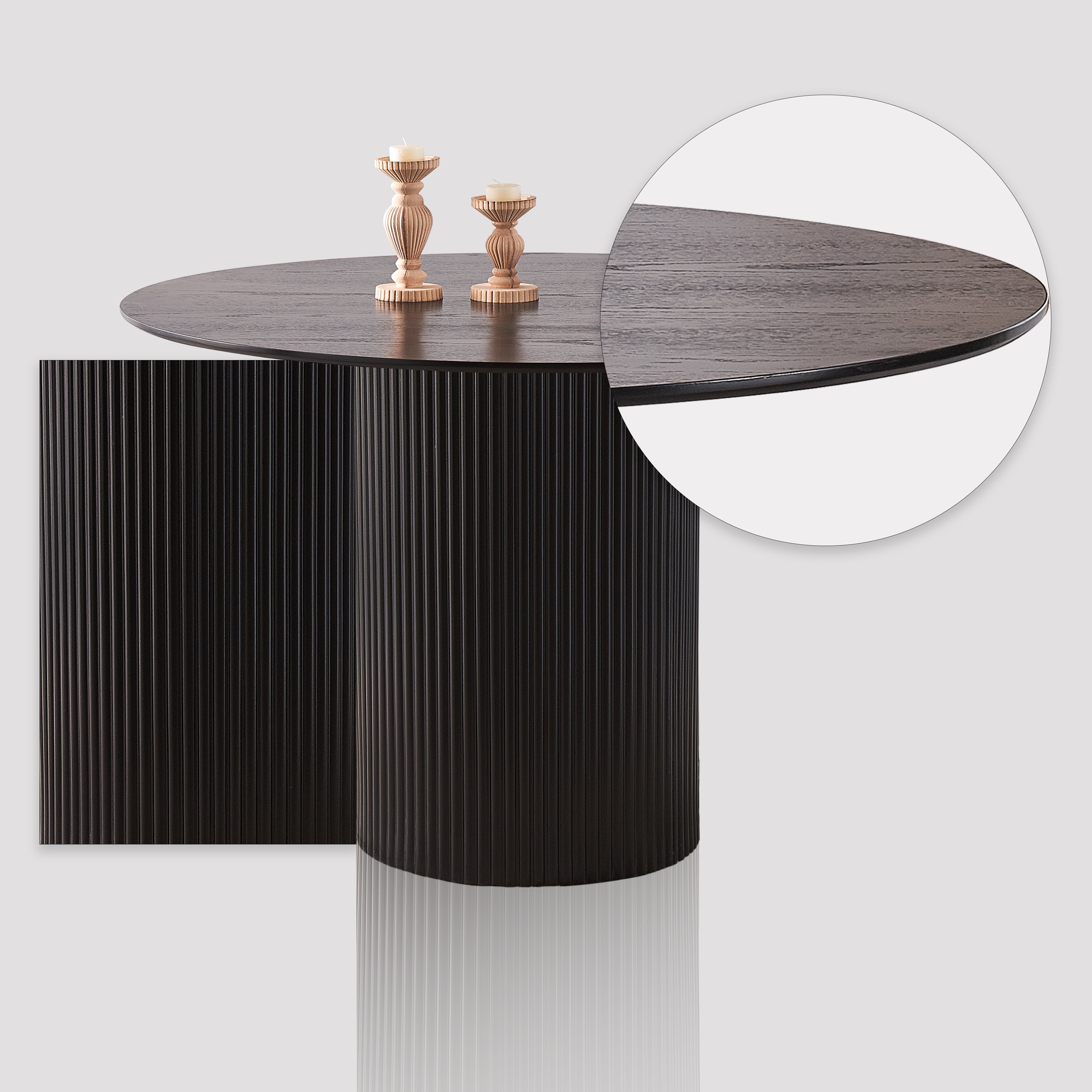 Close up of sleek black finish on round dining table for 6