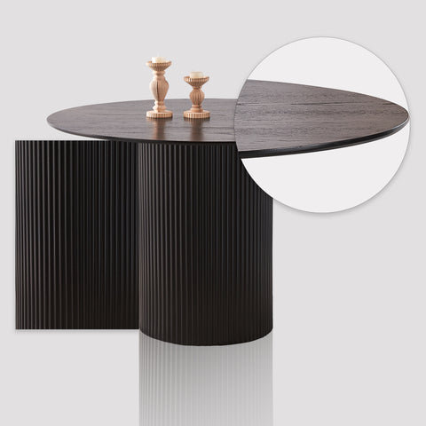 Close up of sleek black finish on round dining table for 6