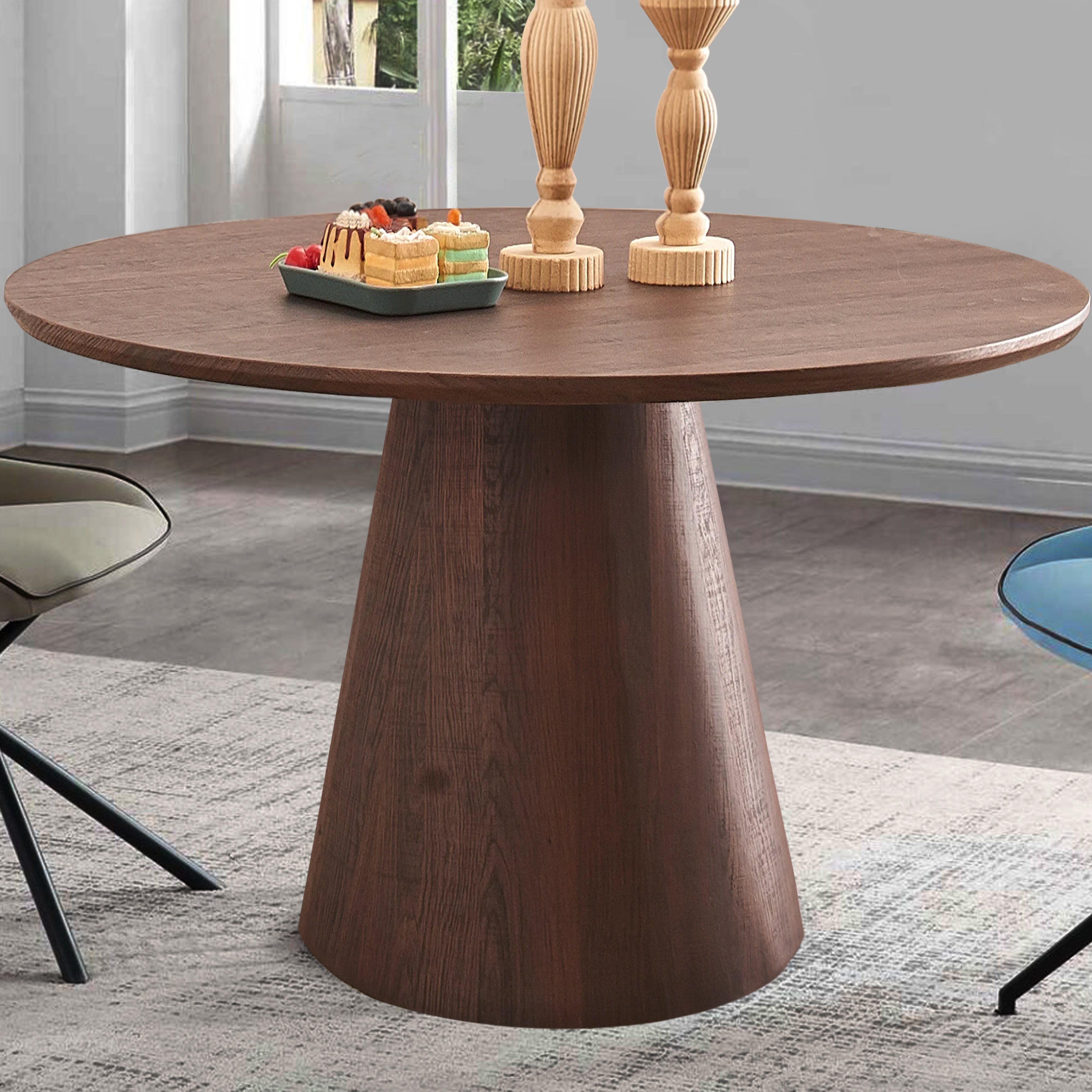 Buy round walnut dining table showing close up of walnut veneer surface
