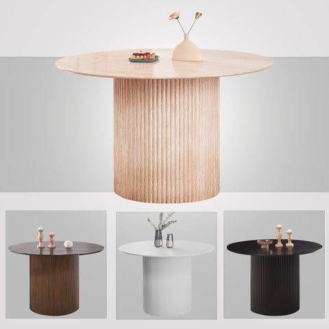 Round ash dining table 6 seater UK styled with dining chairs and place settings